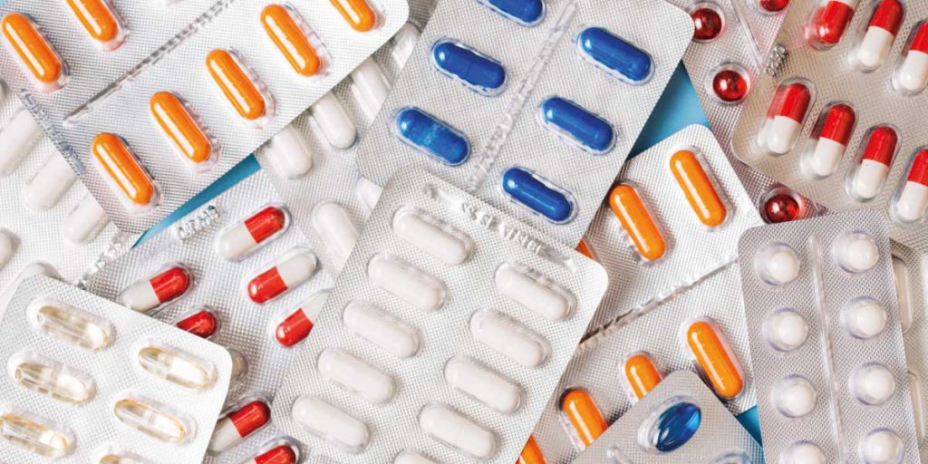 Many pills and tablets of various types displayed together in a single image